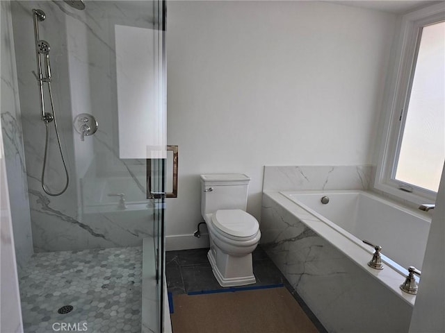 bathroom with tile patterned floors, a marble finish shower, a bath, and toilet