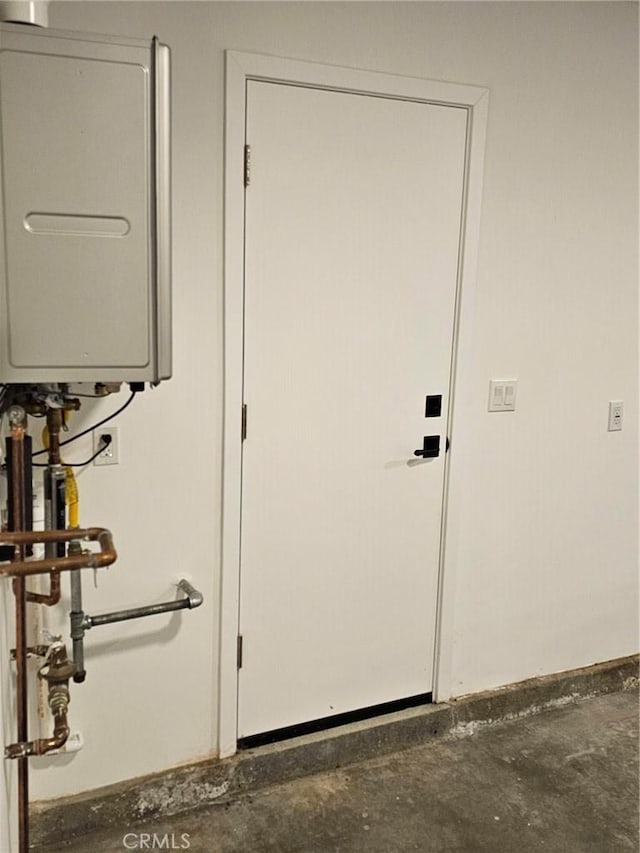 doorway featuring concrete floors
