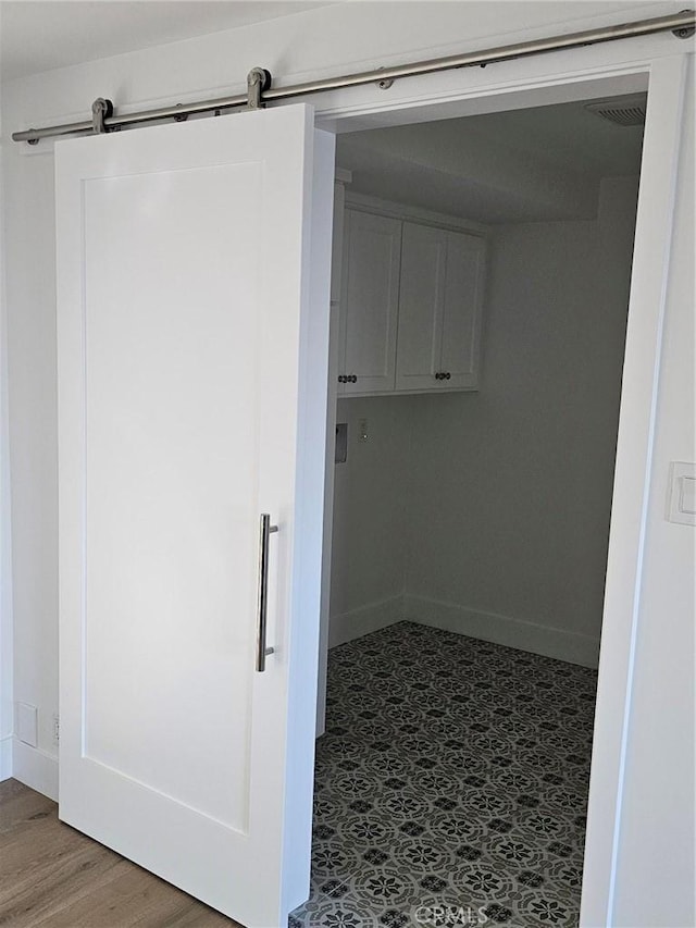 interior space featuring baseboards