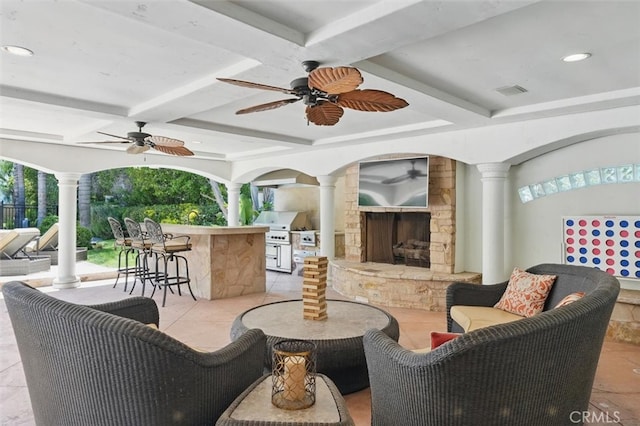 view of patio / terrace featuring a ceiling fan