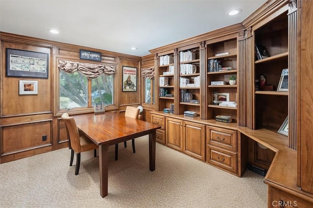 office area with light colored carpet, wood walls, and recessed lighting