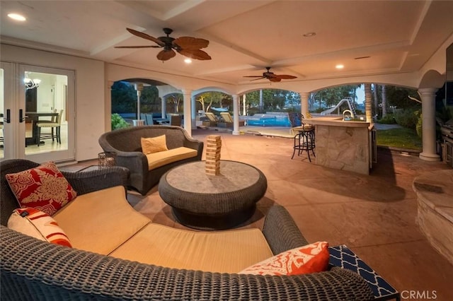view of patio with outdoor lounge area and ceiling fan