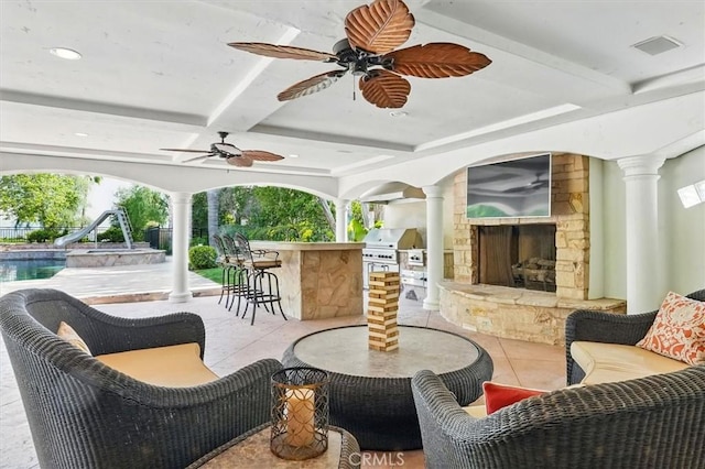 view of patio with outdoor lounge area and ceiling fan
