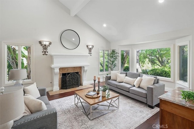living room with high vaulted ceiling, dark wood-style floors, beamed ceiling, recessed lighting, and a fireplace with flush hearth