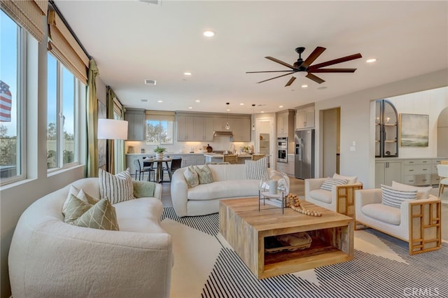 30973 Avenida Ramblas, Highland, CA 92346 - living area featuring ceiling fan, recessed lighting, and visible vents