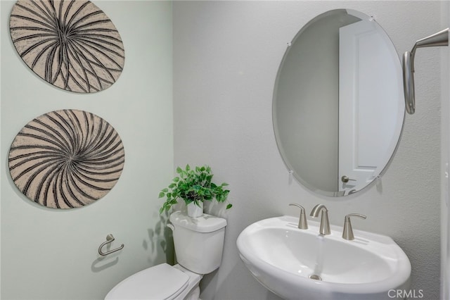 30973 Avenida Ramblas, Highland, CA 92346 - bathroom with toilet and a sink