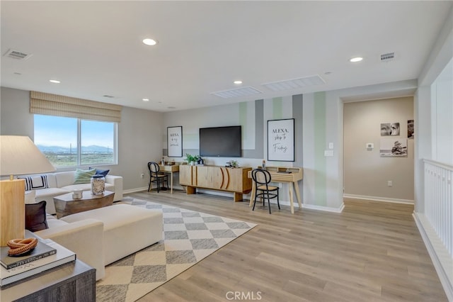 30973 Avenida Ramblas, Highland, CA 92346 - living area with recessed lighting, baseboards, light wood finished floors, and visible vents