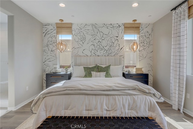 30973 Avenida Ramblas, Highland, CA 92346 - bedroom with baseboards, recessed lighting, and wood finished floors