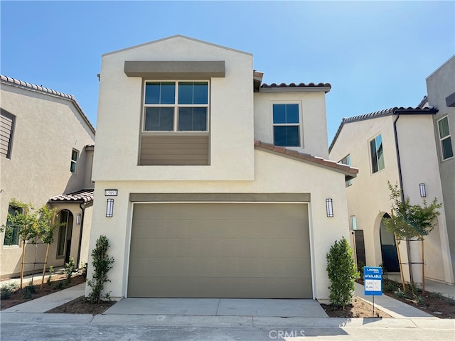15893 Blue Copper Way, Fontana, CA 92336 - view of front of property featuring an attached garage, stucco siding, a tile roof, and concrete driveway