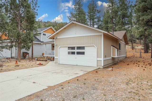view of front of property with driveway and a garage