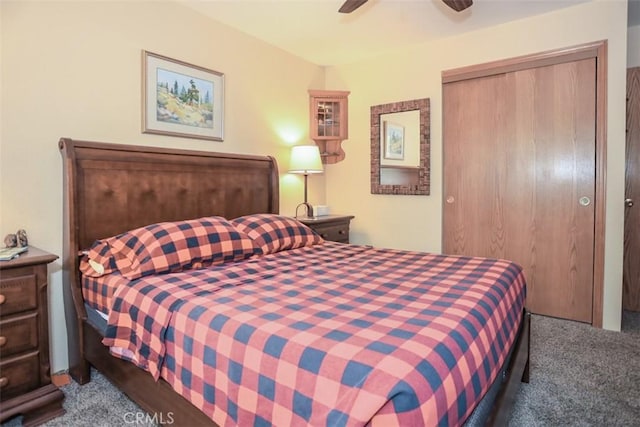 carpeted bedroom with a closet and ceiling fan