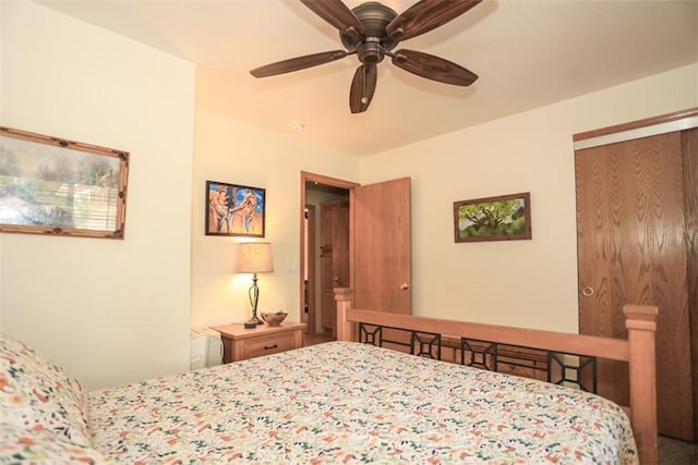 bedroom featuring ceiling fan and a closet