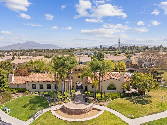 bird's eye view with a residential view and a mountain view