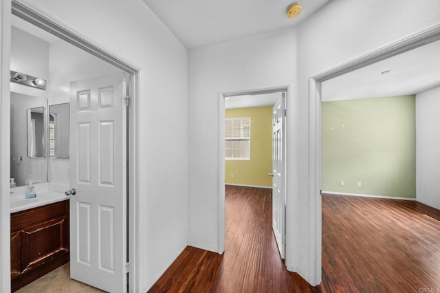 hallway featuring wood finished floors