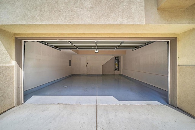 garage featuring gas water heater