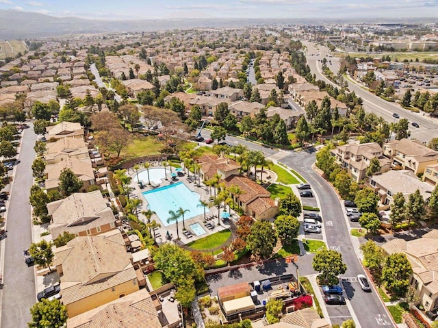 birds eye view of property with a residential view