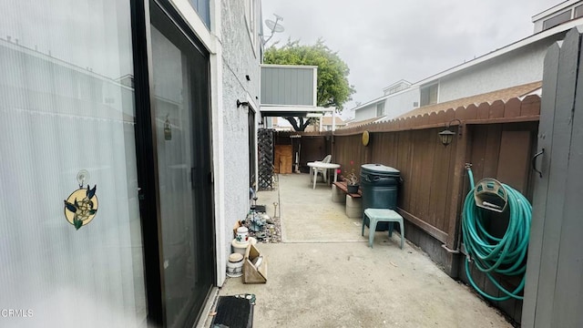 view of patio / terrace with fence