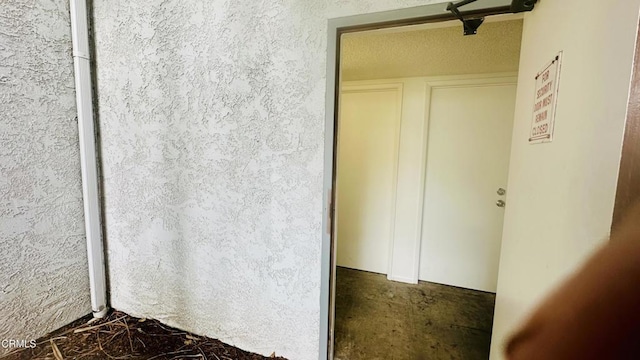 property entrance featuring stucco siding