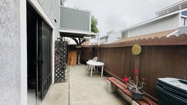 view of patio / terrace with fence and grilling area