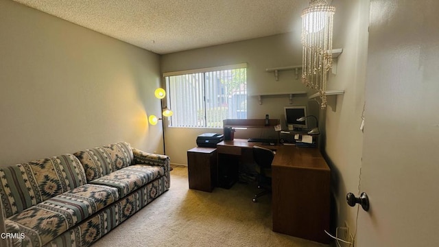 office area featuring carpet flooring and a textured ceiling