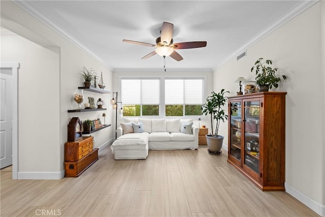 26544 Mahonia Way, Murrieta, CA 92562 - living area featuring ceiling fan, crown molding, and light wood-style floors
