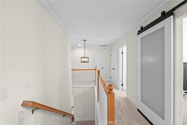 26544 Mahonia Way, Murrieta, CA 92562 - corridor with an upstairs landing, ornamental molding, a barn door, light carpet, and a chandelier