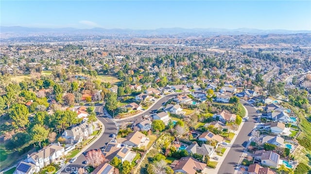 birds eye view of property featuring a residential view and a mountain view