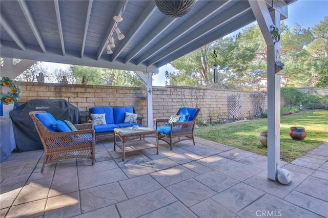 view of patio / terrace featuring fence private yard and an outdoor hangout area