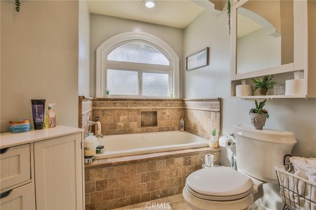 bathroom featuring toilet and a bath