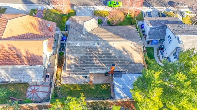 birds eye view of property with a residential view