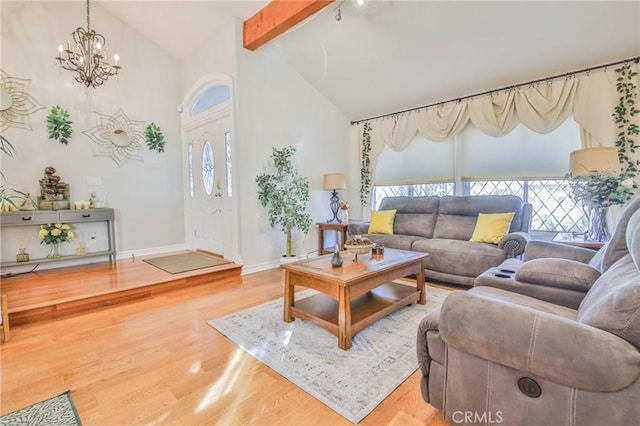living area with wood finished floors, high vaulted ceiling, baseboards, beamed ceiling, and a chandelier