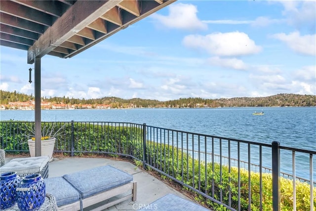 view of patio / terrace featuring a water view