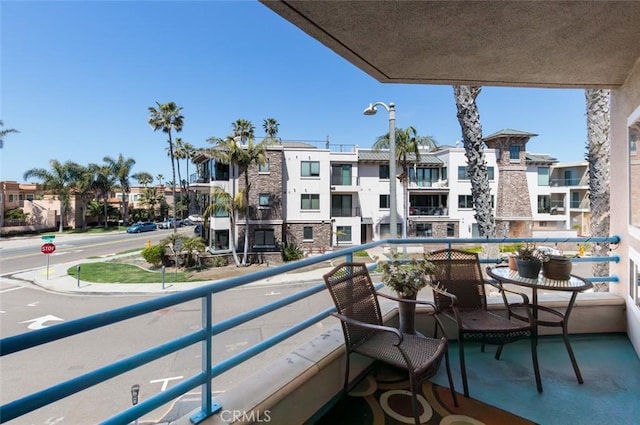 balcony featuring a residential view