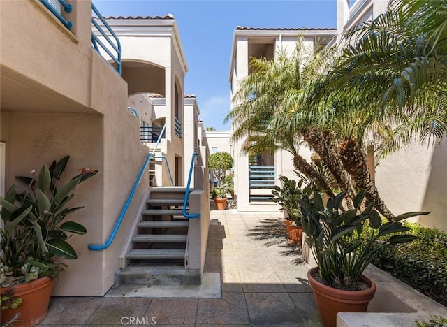 surrounding community featuring stairs