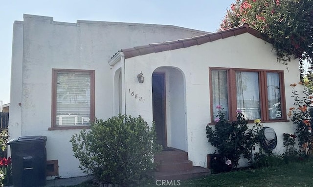 mediterranean / spanish-style house featuring stucco siding