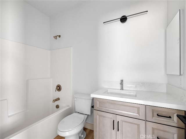 full bathroom with vanity, toilet, shower / tub combination, and wood finished floors