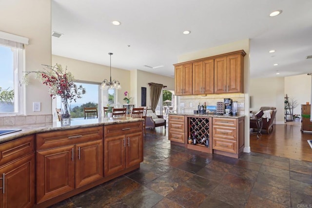 944 Rainbow Crest Rd, Fallbrook, CA 92028 - kitchen featuring plenty of natural light, backsplash, recessed lighting, stone tile floors, and a chandelier