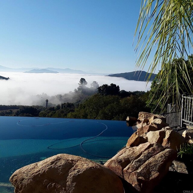 944 Rainbow Crest Rd, Fallbrook, CA 92028 - water view featuring a mountainous background