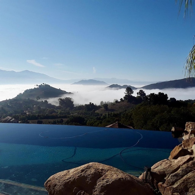 944 Rainbow Crest Rd, Fallbrook, CA 92028 - view of swimming pool featuring a mountain view