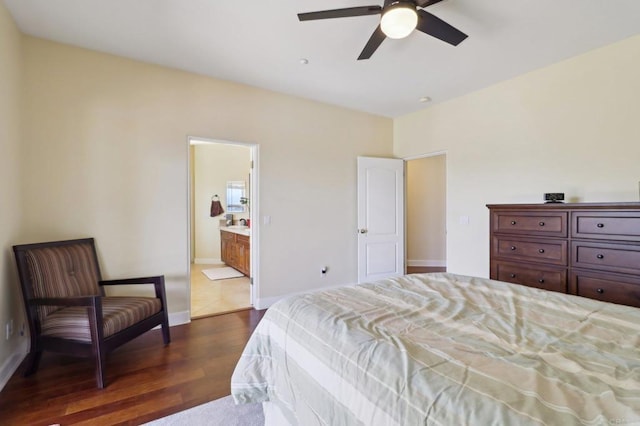 944 Rainbow Crest Rd, Fallbrook, CA 92028 - bedroom with dark wood finished floors, ensuite bathroom, and baseboards