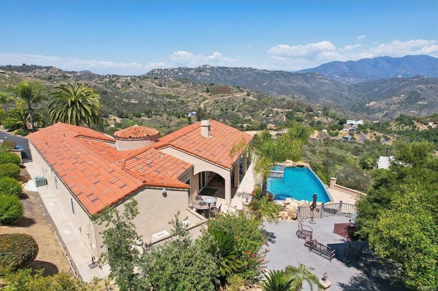 944 Rainbow Crest Rd, Fallbrook, CA 92028 - view of subject property with a pool area and a mountain backdrop