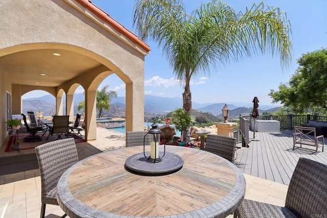 944 Rainbow Crest Rd, Fallbrook, CA 92028 - view of patio featuring outdoor dining area, an in-ground hot tub, an outdoor pool, and a deck with mountain view