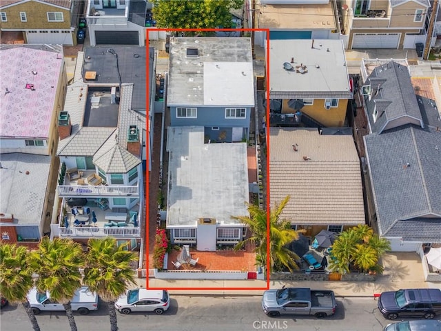 aerial perspective of suburban area with property parcel outlined