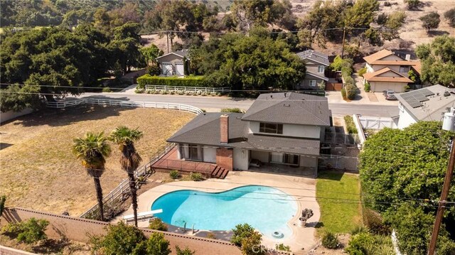 1430 Caballo Ranch Rd, San Dimas, CA 91773 - view of pool with a patio, a fenced backyard, a diving board, and a fenced in pool