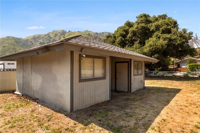 1430 Caballo Ranch Rd, San Dimas, CA 91773 - view of outbuilding featuring an outdoor structure, a mountain view, and fence