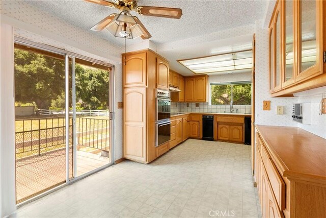 1430 Caballo Ranch Rd, San Dimas, CA 91773 - kitchen featuring light countertops, glass insert cabinets, double oven, and light floors