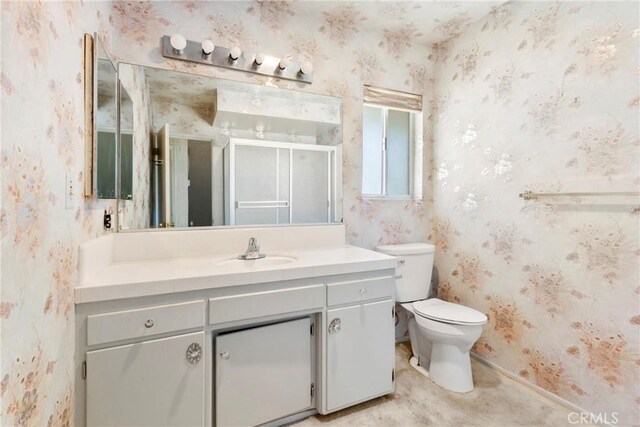 1430 Caballo Ranch Rd, San Dimas, CA 91773 - bathroom featuring vanity, a shower with door, toilet, and wallpapered walls