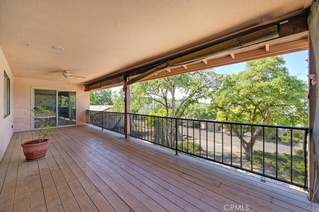 deck featuring a ceiling fan