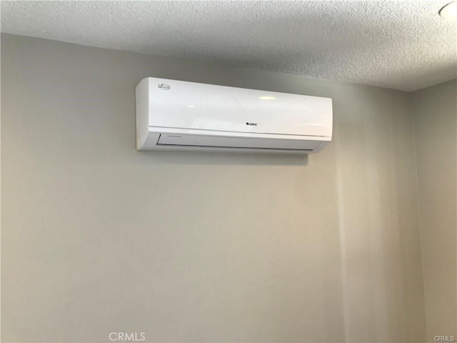 539 E 223rd St, Carson, CA 90745 - detailed view of an AC wall unit and a textured ceiling
