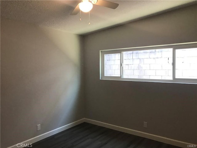 539 E 223rd St, Carson, CA 90745 - spare room with dark wood-style flooring, ceiling fan, and a textured ceiling